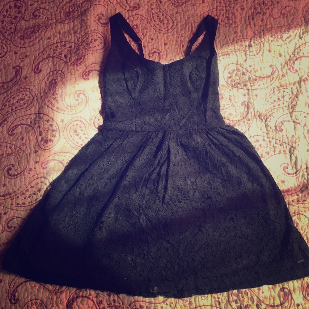 Navy blue above the knee dress. Laced material.
